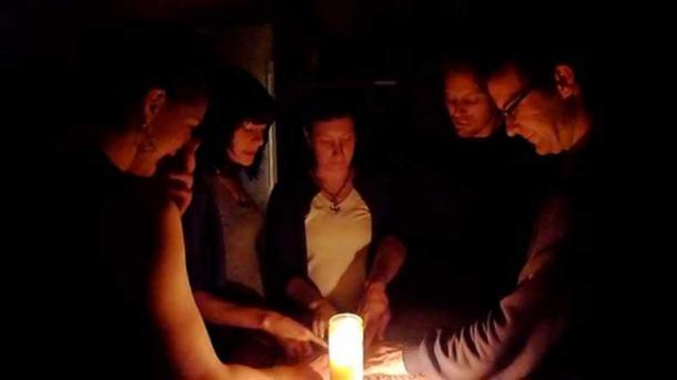 Participants in a Ouija game.