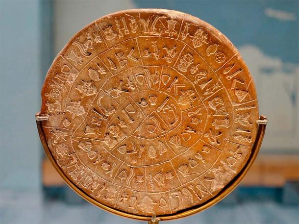 The Phaistos Disc is a clay disk dating back to the second millennium BC on which is inscribed in a so far undeciphered hieroglyphic-like ancient script. (Olaf Tausch / CC BY 3.0)
