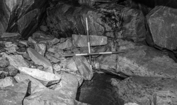 Pit in the cave which contained human remains after the excavation. Source: T Kahlert via Department of Culture