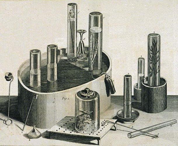 Pneumatic trough, glass collecting cylinders and other equipment used by Priestley in his experiments on gases, including nitrous oxide. (Astrochemist / Public Domain)