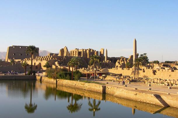 The Precinct of Amun-Re, the largest of the precincts of the Karnak Temple complex, as seen from the sacred lake in Luxor, where the Karnak obelisk dedicated to Queen Hatshepsut was recently re-erected. (Taranis-iuppiter / CC BY-SA 3.0)