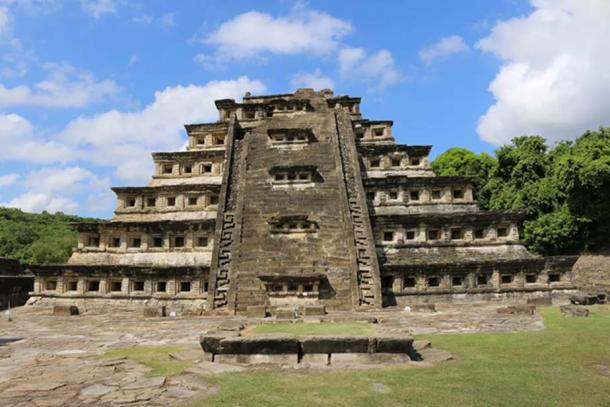 The Pyramid of the Niches at El Tajin. The monumental access stairway, facing due East, is a later addition that covered many of the original niches. Because of the addition of this stairway, the number of visible niches no longer adds up to 365 – the number of days in a solar year. (Photo: ©Marco Vigato)