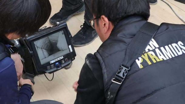 Scan Pyramids researchers viewing what their hi-tech scanners have revealed. (Ministry of Tourism and Antiquities)