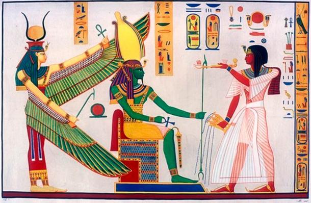 Rameses III censing and libating before Ptah-Sokar-Osiris, protected by winged Isis. Scene from tomb of Ramses III