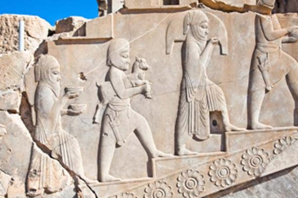Relief decoration of displayed subjects on the ruins of the Apadana. (Aleksandar Todorovic / Adobe Stock)