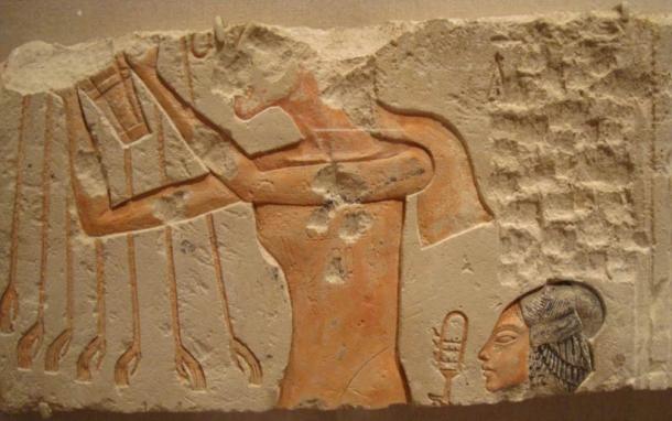 Relief depicting Akhenaten and His Daughter Offering to the Aten