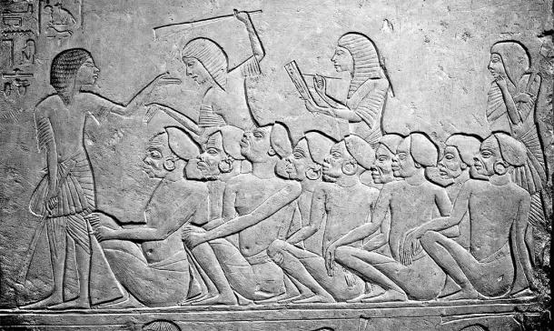 Relief showing Ancient Egyptian slave market, with Nubian slaves waiting to be sold. Archaeological Museum, Bologna. (Mike Knell/CC BY-SA 2.0)