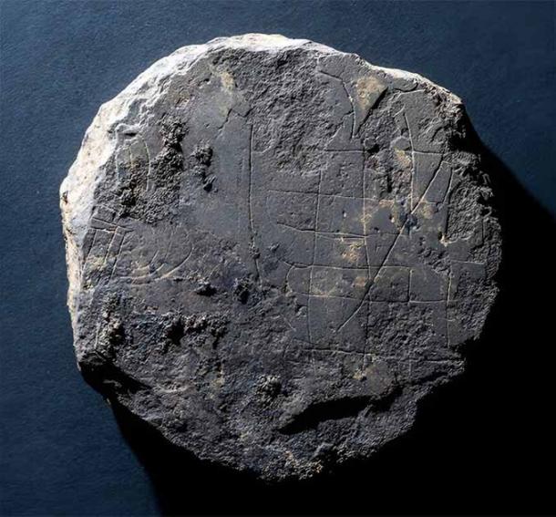 Remains of an ancient hnefatafl board discovered at the newly identified site of the Monastery of Deer, where notes within the Book of Deer are believed to have been written. (Michael Sharpe / University of Southampton)