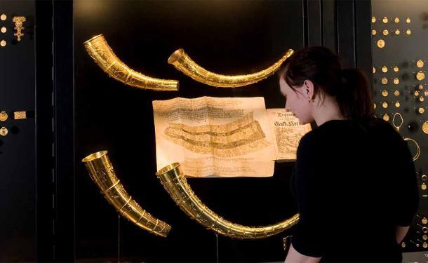 Replicas of the Golden Horns of Gallehus on display in Denmark. (Public domain)