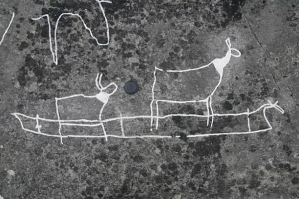 Rock art Image of potential skin boat transporting two reindeer. Photo credited to Martin Kristoffer Hykkerud.