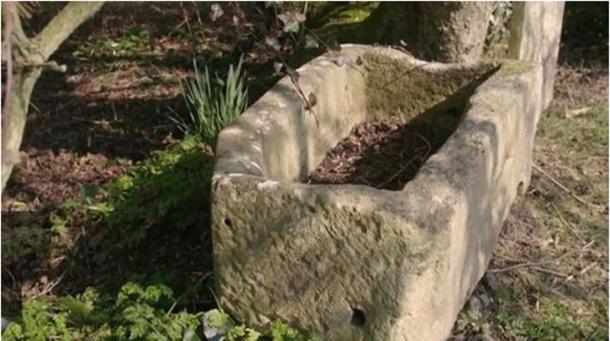 The child’s stone coffin.