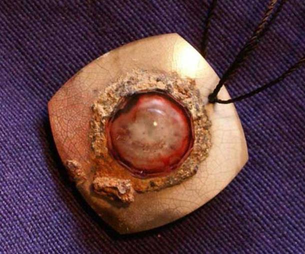 Ruby eye pendant from an ancient civilization in Mesopotamia. Adilnor Collection.