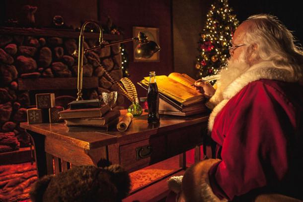 Santa Claus at Desk with Cola Bottle (Cinestock / Adobe Stock)