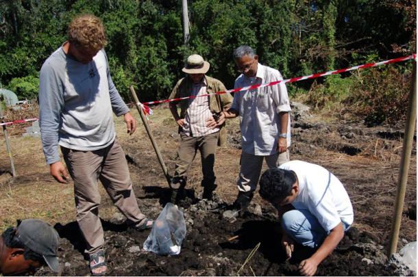 Scientists excavating at Mare aux Songes. Kenneth Rijsdick, Dutch paleontologist and leader of the project, Anwar Janoo, Mauritian paleontologist, and Nipon Medhi doing fieldwork.