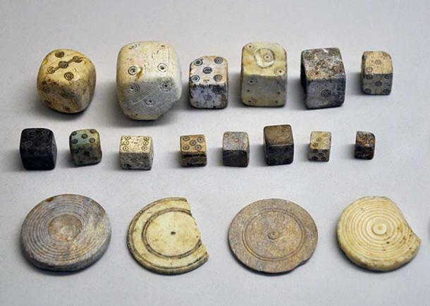 Selection of Roman era dice and jetons (tokens).