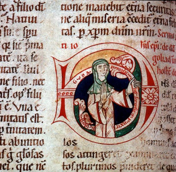 Self portrait of Guda, a 12th century nun. The inscription she holds reads, “Guda, peccatrix mulier scripsit et pinxit hunc librum,” translated as “Guda, a sinful woman, wrote and painted this book.”