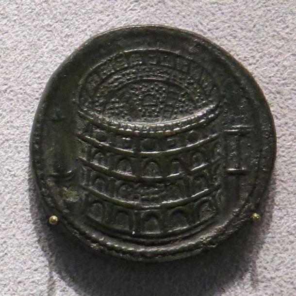 Sestertius of Titus celebrating the inauguration of the Colosseum, minted in 80 AD.