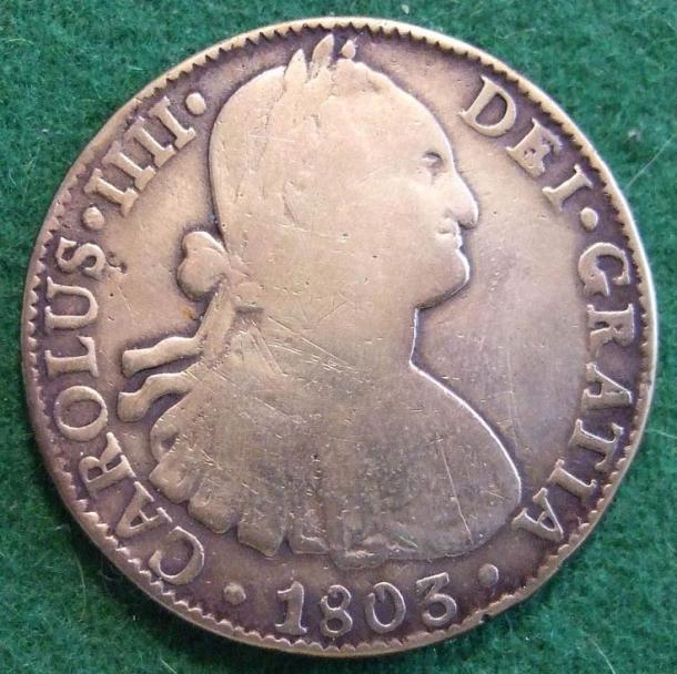 An 1803 Spanish piece of eight, a silver coin that circulated all around the world then.
