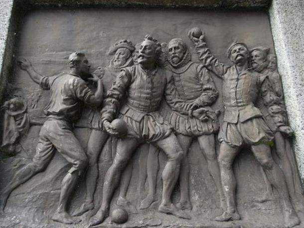 Sir Francis Drake whilst playing bowls on Plymouth Hoe is informed of the approach of the Spanish Armada. Bronze plaque by Joseph Boehm, 1883, base of Drake statue, Tavistock.