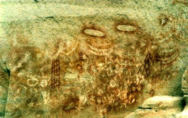 Stencil art in Australia showing unique clan markers and dreamtime stories symbolizing attempts to catch the deceased's spirit.