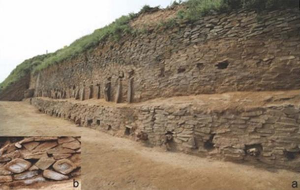 Stone buttresses defend the second and third levels of the step pyramid structure. There are symbols within the stonework. (Image: Zhouyong Sun and Jing Shao/Antiquity)