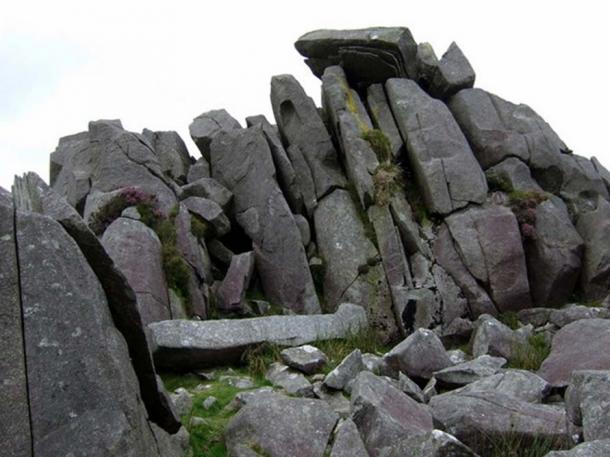 Stones at Carn Menyn, Wales, as an example of bluestone.These dolerite slabs, split by frost action, seem to be stacked, and ready for the taking.