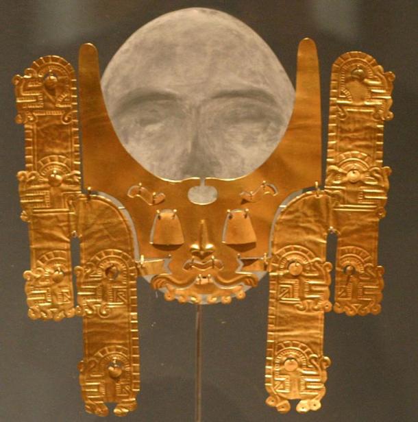 “Stylized feline nose adornment from Malagana 200BC-200AD as part of the exhibit "The Spirit of Ancient Columbian Gold". When wearing this large nose ring, a shaman transformed into a jaguar. Powerful predators, jaguars symbolized authority and status.”