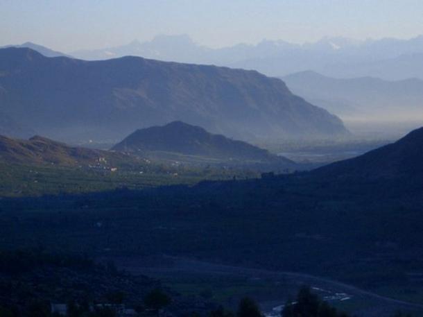 A view of the Swat Valley and Barikot hill in the background between two higher ridges in remote Pakistan. (Ca' Foscari University)