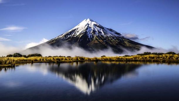 Mount Taranaki in New Zealand is a dormant volcano and an emblematic part of the landscape. Rūaumoko, the god of earthquakes and volcanos, is said to be the unborn child of Rangi and Papa. (M / Adobe Stock)