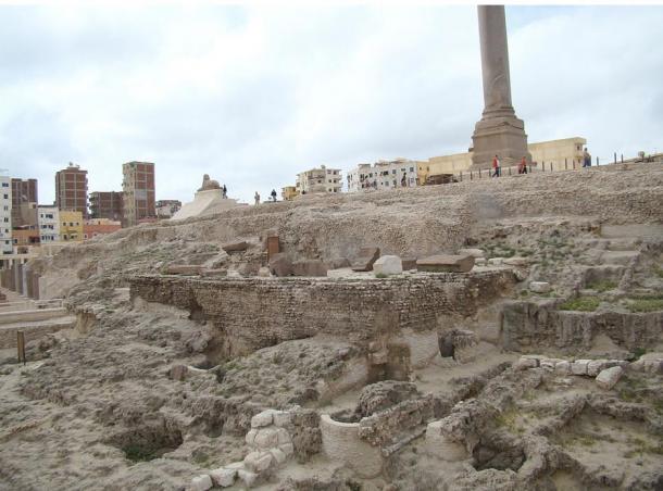 The remains of the ancient site of the Temple complex of Sarapis at Alexandria. It once included the temple, a library, lecture rooms, and smaller shrines but after many reconstructions and conflict over the site it is mostly ground level ruins.