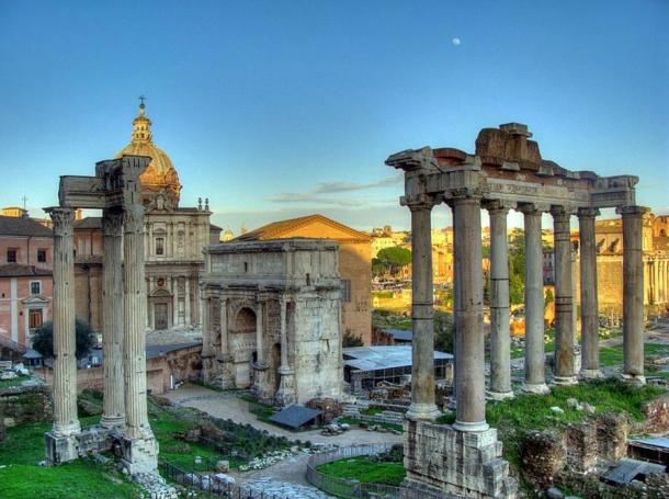 Ruins of the Temple of Saturn (eight columns to the far right), with three columns from the Temple of Vespasian and Titus (left) and the Arch of Septimius Severus (center). 