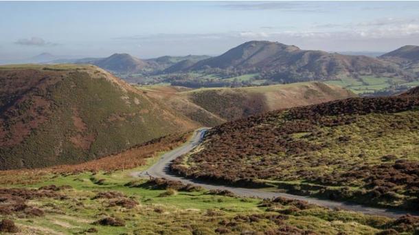 The Burway and Bodbury Hill (left) at Carding Mill Valley and the Long Mynd, Shropshire. (© National Trust Images/PJ Howsam)