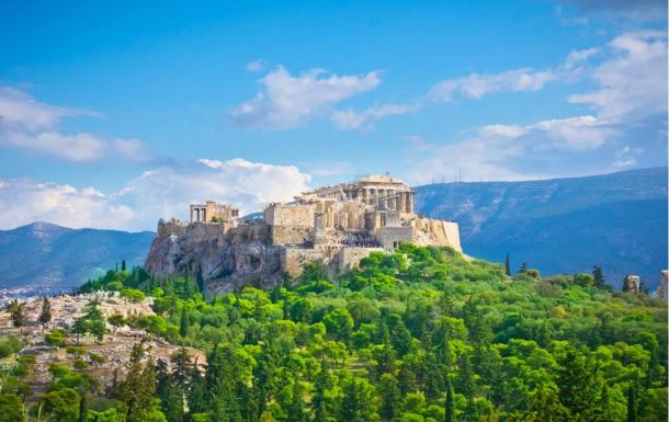 The Parthenon sits within the Acropolis in Athens,  Greece.