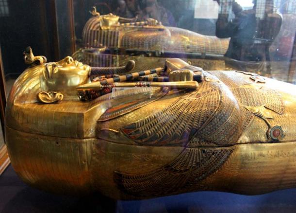 (Foreground) The dazzling, solid gold innermost coffin of King Tutankhamun and (Background) the middle coffin; from a nest of three. As Treasurer, Maya was in charge of assembling funerary goods destined for KV62. Egyptian Museum, Cairo.