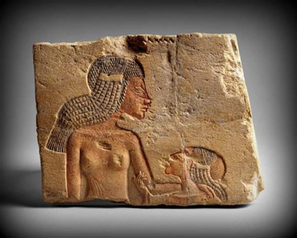 The demonstration of affection in this detail showing two of Akhenaten’s daughters – probably Meritaten and Ankhesenamun – is typical of the intimacy allowed in representations of the royal family during the Amarna period.