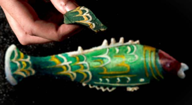 The fragment of Roman glass above an artist’s impression of how the fish bottle would have looked. (National Trust Images / Rod Kirkpatrick)