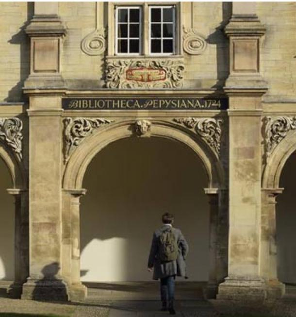 The frieze inscription 'Bibliotheca Pepysiana 1724' records the date of the Pepys Library's arrival at Magdalene College, Cambridge, 300 years ago. Painted above the inscription are Pepys' arms and his motto 'Mens cujusque is est quisque' ('The mind's the man'). (Magdalene College, Cambridge)