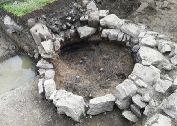 The kiln with its deposits removed. The charcoal-rich deposits in the kiln flue can be seen at the top. (Beaubec Excavations / Fair Use)