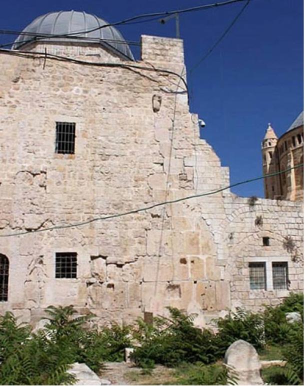The masonry of the Cenacle’s eastern wall demonstrates its “layered” history—from the Second Temple period through the Byzantine and Crusader periods to the Ottoman period. Visible on the right is the Dormition Abbey. (David C. Clausen/Biblical Archaeology)