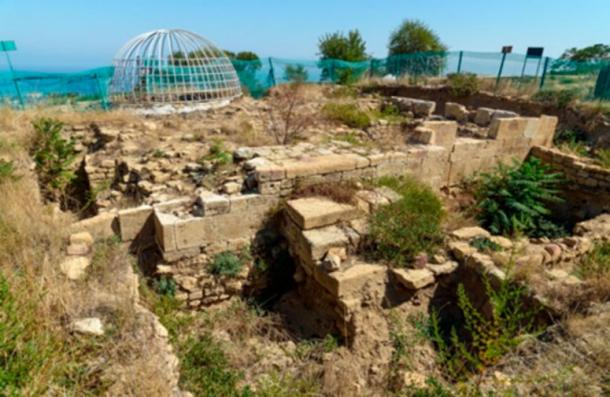 The modern wire frame covers the building in the Naryn-Kala citadel. (© NUST MISIS/CC BY 4.0)