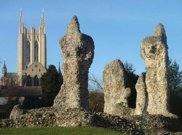 The ruins of the Abbey of St. Edmund with the more recent cathedral in the background.
