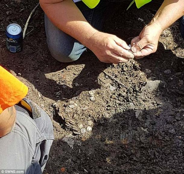 The stash of over 600 coins were found during an organised metal detector hunt in Bridport, Dorset, UK