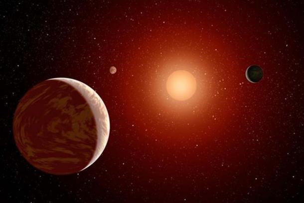 This artist's concept illustrates a young, red dwarf star surrounded by three planets. Such stars are dimmer and smaller than yellow stars like our sun, which makes them ideal targets for astronomers wishing to take images of planets outside our solar system. (NASA/JPL-Caltech)