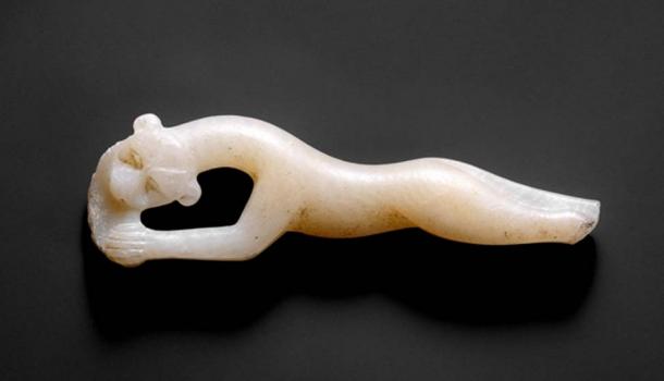 This exquisite alabaster handle of a cosmetic spoon in the form of a leaping leopard was discovered in the Malqata Palace of Amenhotep III in western Thebes. 18th Dynasty. (Metropolitan Museum of Art)