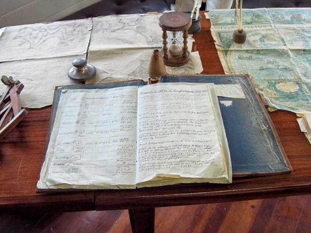 Though Columbus's epic 1492 voyage involved a fake captain's log to improve crew morale, this captain's log is real. A replica of Admiral Nelson's Grand Turk logbook with charts. (JoJan / CC BY-SA 3.0)