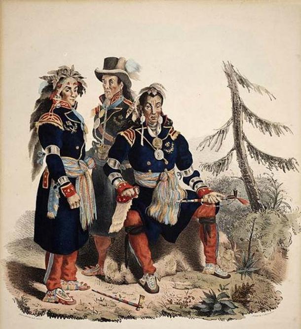 Three Huron-Wyandot chiefs from the Huron reservation (Lourette) now called Wendake in Quebec Canada. At far left is Michel Tsioui (Teachendale), war chief. Center is Stanislas Coska (Aharathaha), second chief of the council. At far light is Andre Romain (Tsouhahissen), first chief of the council. (Public Domain)