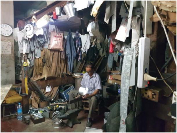 Tinsmith tinkering away at toukbullets for making dumplings. (Image: Courtesy of the author).