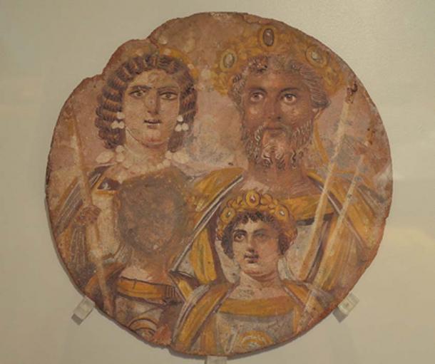 Tondo showing the Severan dynasty: Septimius Severus with Julia Domna, Caracalla and Geta, whose face has been erased, probably because of the damnatio memoriae put against him by Caracalla, from Djemila (Algeria), circa AD 199-200, Altes Museum, Berlin. (CC BY-SA 2.0)
