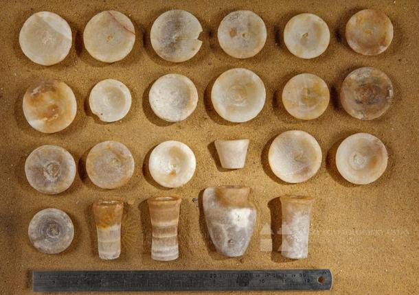 Travertine model vessels unearthed at the tomb of Khentkaus III, Abusir, Egypt. 