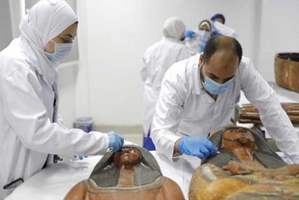 Two beautifully painted and sculpted sarcophagi belonging to Sennedjem and his wife were moved. (Ministry of Antiquities)